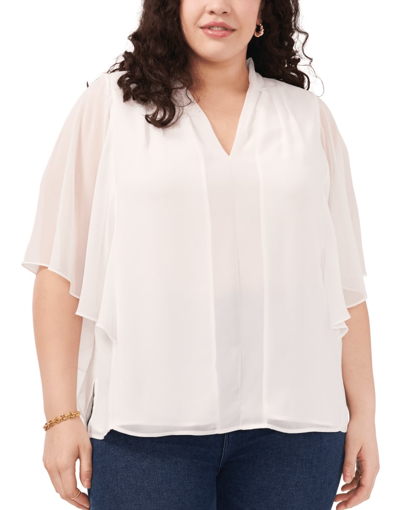 Front of a model wearing a size 1X Katie Ruffle V Neck Blouse in 103-NEW IVORY by Vince Camuto. | dia_product_style_image_id:261950